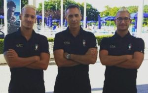 Il tecnico Emanuele Sacchi tra gli atleti Federico Vanelli e Simone Ruffini